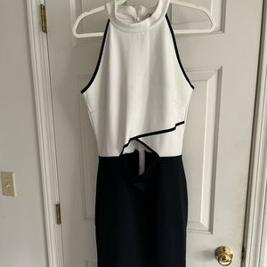 Black and white cut out sleeveless dress is 14